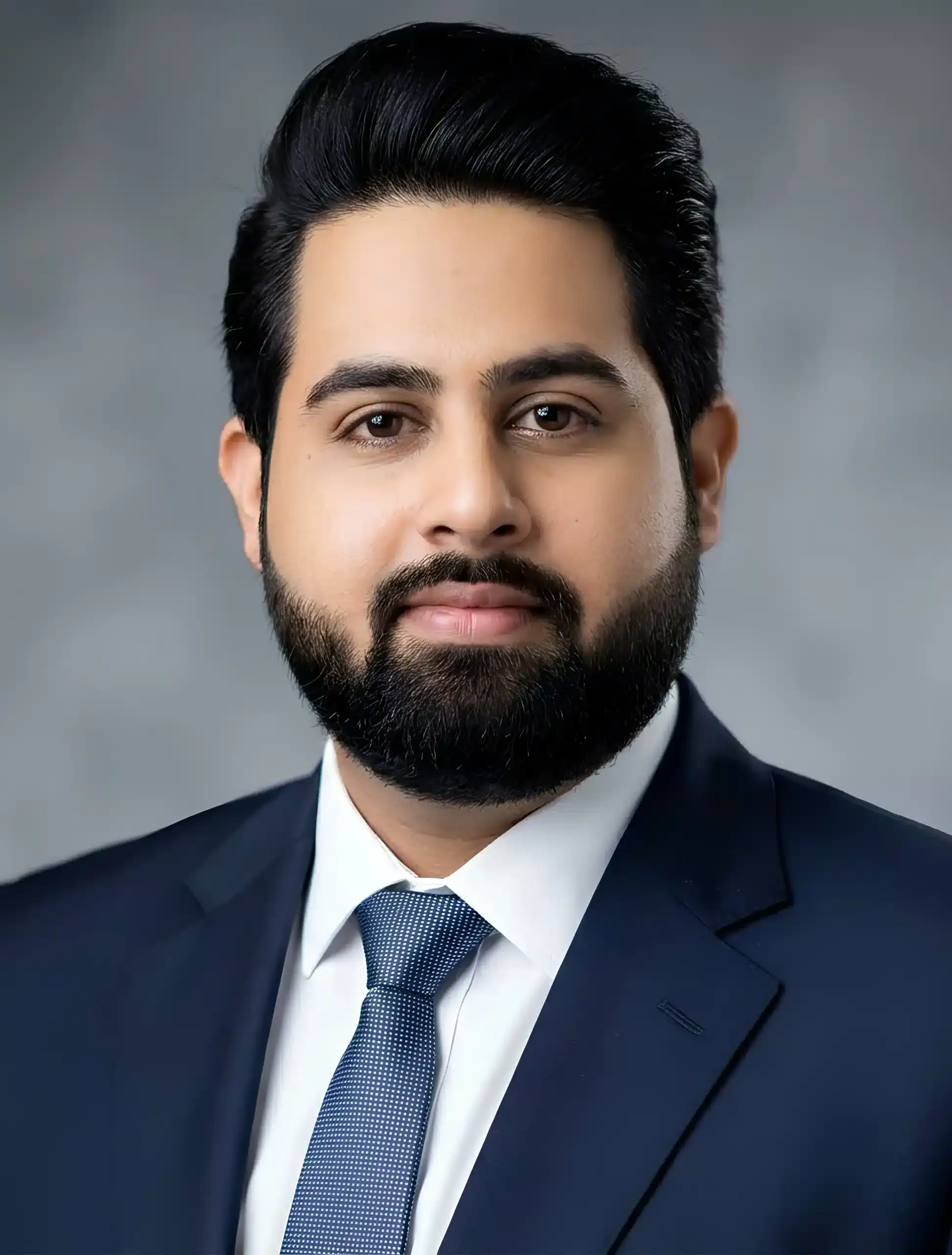 Portrait of a professional man in a suit for About section.